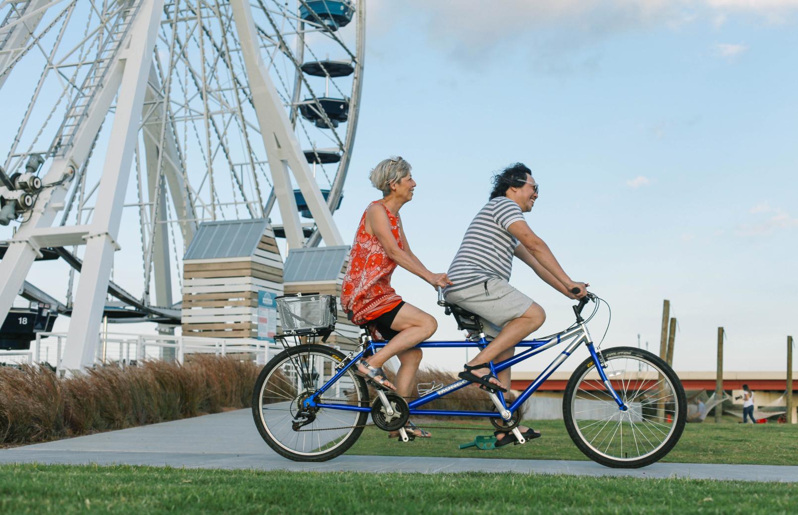 Wheeler District Biking Couple by Wheeler Wheel